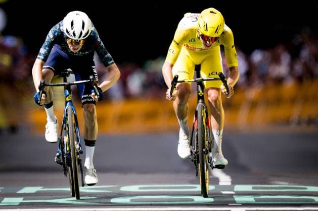 Danish Jonas Vingegaard of Team Visma-Lease a Bike and Slovenian Tadej Pogacar of UAE Team Emirates sprint to the finish of stage 11 of the 2024 Tour de France cycling race, from Evaux-les-Bains to Le Lioran, France (211km) on Wednesday 10 July 2024. The 111th edition of the Tour de France starts on Saturday 29 June and will finish in Nice, France on 21 July. JASPERxJACOBS  x96200837x