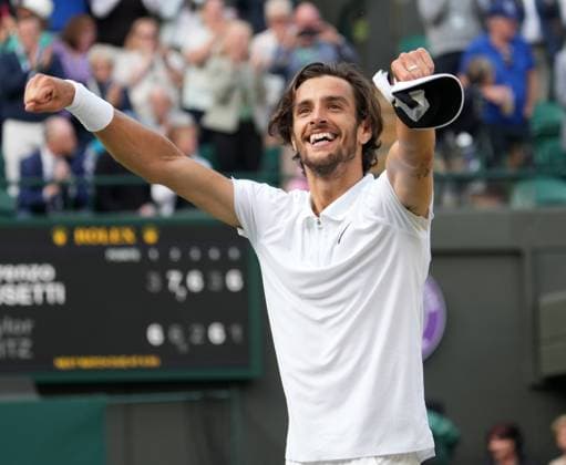 Lawn Tennis - 2024 Wimbledon Championship Mens singles - Lorenzo Musetti (ITA) v Taylor Fritz (USA) All England Lawn Tennis & Croquet Club - Wednesday 10h July 2024 Lorenzo Musetti (ITA) celebrates winning the match 