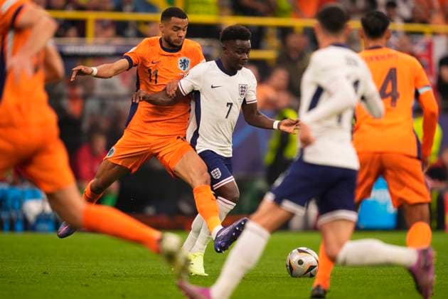 England s Bukayo Saka and Cody Gakpo of the Netherlands during a semifinal match between Netherland and England at the Euro 2024 soccer tournament in Dortmund at Signal Iduna Park, Germany, Wednesday, July 10, 2024 - Soccer .  Copyright: xFabioxFerrari LaPressex