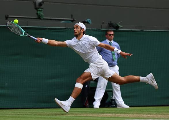 10th July 2024; All England Lawn Tennis and Croquet Club, London, England; Wimbledon Tennis Tournament, Day 10; Lorenzo Musetti (ITA) from the baseline against Taylor Fritz (USA), mens singles quarter final match  ActionPlus12666679 JohnxPatrickxFletcher