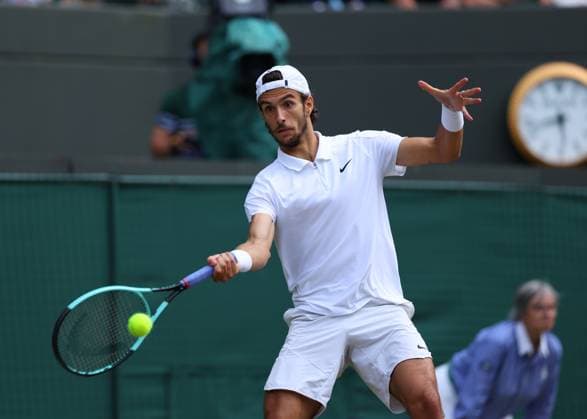 10th July 2024; All England Lawn Tennis and Croquet Club, London, England; Wimbledon Tennis Tournament, Day 10; Lorenzo Musetti (ITA) from the baseline against Taylor Fritz (USA), mens singles quarter final match  ActionPlus12666661 JohnxPatrickxFletcher