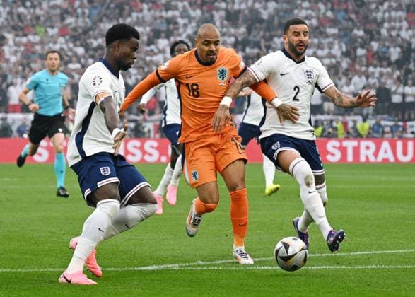 Germany Soccer Euro 2024 Netherlands - England 8726688 10.07.2024 From left, England s Marc Guehi, Netherlands Donyell Malen and England s Jarrod Bowen struggle for a ball during the UEFA EURO, EM, Europameisterschaft,Fussball 2024 semi-final soccer match between Netherlands and England at the BVB Stadion Dortmund, in Dortmund, Germany. Alexey Filippov Sputnik Dortmund Germany  Copyright: xAlexeyxFilippovx