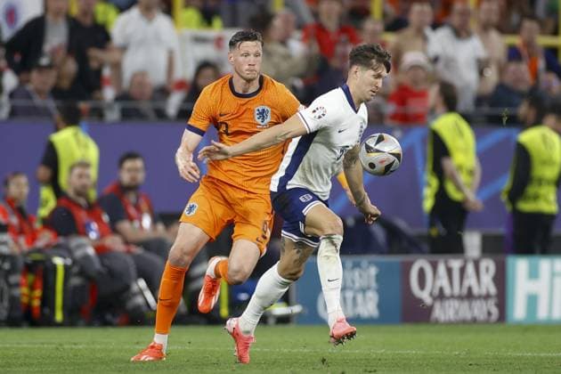 DORTMUND, 10-07-2024, BVB Stadium , European Football Championship Euro2024, Semi finals match no.50 between Netherlands and England. (L-R) Netherlands player Wout Weghorst, England player John Stones Netherlands - England (Euro2024)  x25730076x Copyright: