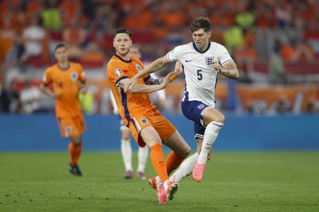 DORTMUND, 10-07-2024, BVB Stadium , European Football Championship Euro2024, Semi finals match no.50 between Netherlands and England. (L-R) Netherlands player Wout Weghorst, England player John Stones Netherlands - England (Euro2024)  x25730085x Copyright: