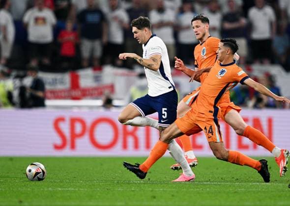 Germany Soccer Euro 2024 Netherlands - England 8726697 10.07.2024 From left, England s John Stones, Netherlands Tijjani Reijnder and Netherlands Wout Weghorst struggle for a ball during the UEFA EURO, EM, Europameisterschaft,Fussball 2024 semi-final soccer match between Netherlands and England at the BVB Stadion Dortmund, in Dortmund, Germany. Alexey Filippov Sputnik Dortmund Germany  Copyright: xAlexeyxFilippovx