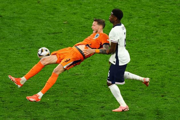 Wout Weghorst of The Netherlands is challenged by Marc Guà hi of England Netherlands v England, UEFA European Championship, EM, Europameisterschaft 2024, Semi Final, Football, BVB Stadion, Dortmund, Germany, 10 Jul 2024 EDITORIAL USE ONLY No use with unauthorised audio, video, data, fixture lists, club league logos or live services. Online in-match use limited to 120 images, no video emulation. No use in betting, games or single club league player publications. Copyright: xKieranxMcManus Shutterstockx 14576895cd