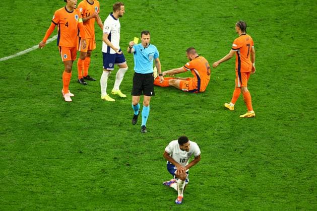 Jude Bellingham of England receives a yellow card from Referee Felix Zwayer after fouling Stefan de Vrij of The Netherlands Netherlands v England, UEFA European Championship, EM, Europameisterschaft 2024, Semi Final, Football, BVB Stadion, Dortmund, Germany, 10 Jul 2024 EDITORIAL USE ONLY No use with unauthorised audio, video, data, fixture lists, club league logos or live services. Online in-match use limited to 120 images, no video emulation. No use in betting, games or single club league player publications. Copyright: xKieranxMcManus Shutterstockx 14576895ci