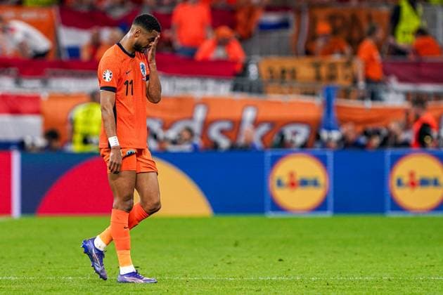 2024-07-10 Netherlands v England - UEFA EURO, EM, Europameisterschaft,Fussball 2024 Semi Final DORTMUND, NETHERLANDS - JULY 10: Cody Gakpo of the Netherlands looks looks dejected after conceding his sides second goal during the UEFA EURO 2024 Semi Final match between Netherlands and England at BVB Stadion Dortmund on July 10, 2024 in Dortmund, Netherlands. Dortmund BVB Stadion Dortmund Netherlands Content not available for redistribution in The Netherlands directly or indirectly through any third parties. Copyright: xAndrexWeeningx