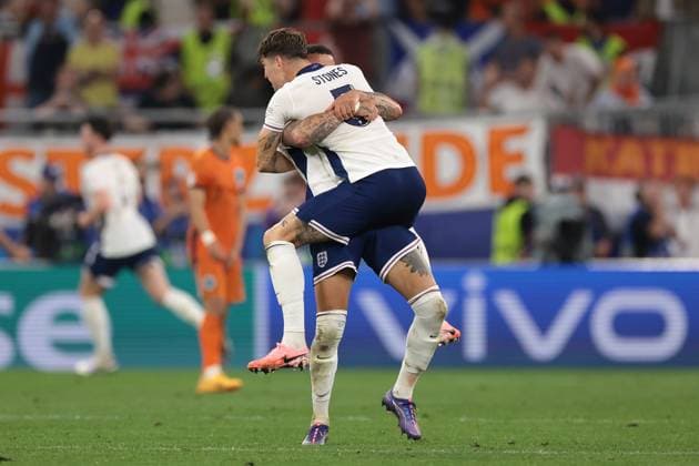 Dortmund, Germany, 10th July 2024. Kyle Walker of England celebrates the 2-1 victory and passage to the final with team mate John Stones following the final whistle of the UEFA European Championships semi final match at BVB Stadion, Dortmund. Picture credit should read: Jonathan Moscrop Sportimage EDITORIAL USE ONLY. No use with unauthorised audio, video, data, fixture lists, club league logos or live services. Online in-match use limited to 120 images, no video emulation. No use in betting, games or single club league player publications. SPI-3223-0061