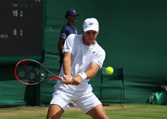 11th July 2024; All England Lawn Tennis and Croquet Club, London, England; Wimbledon Tennis Tournament, Day 11; Kaylan Bigun (USA) from the baseline against Amir Omarkhanov (KAZ), Boys Singles Third Round  ActionPlus12666941 JohnxPatrickxFletcher