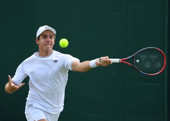 11th July 2024; All England Lawn Tennis and Croquet Club, London, England; Wimbledon Tennis Tournament, Day 11; Kaylan Bigun (USA) from the baseline against Amir Omarkhanov (KAZ), Boys Singles Third Round  ActionPlus12666942 JohnxPatrickxFletcher