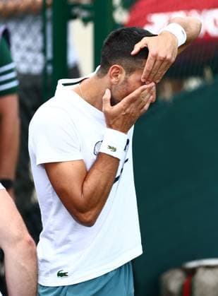 Novak Djokovic adjusts his contact lens Wimbledon Tennis Championships, Day 11, The All England Lawn Tennis and Croquet Club, London, UK - 11 Jul 2024  Copyright: xJamesxMarsh Shutterstockx 14580282ca