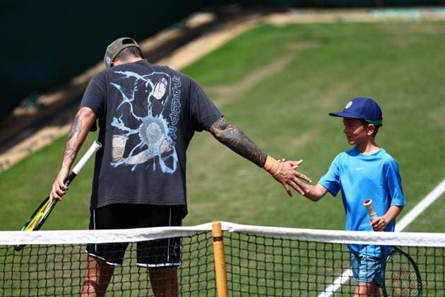 Nick Kyrgios practises with the son of Novak Djokovic Wimbledon Tennis Championships, Day 11, The All England Lawn Tennis and Croquet Club, London, UK - 11 Jul 2024  Copyright: xJamesxMarsh Shutterstockx 14580282by