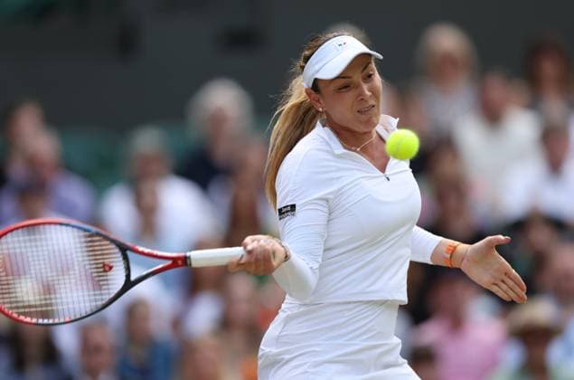 (240711) -- LONDON, July 11, 2024 -- Donna Vekic hits a return during the women s singles semifinal match between Jasmine Paolini of Italy and Donna Vekic of Croatia at Wimbledon tennis Championship in London, Britain, July 11, 2024. ) (SP)BRITAIN-LONDON-TENNIS-WIMBLEDON-WOMEN S SINGLES-SEMIFINALS LixYing 