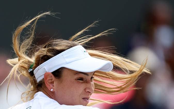 (240711) -- LONDON, July 11, 2024 -- Donna Vekic competes during the women s singles semifinal match between Jasmine Paolini of Italy and Donna Vekic of Croatia at Wimbledon tennis Championship in London, Britain, July 11, 2024. ) (SP)BRITAIN-LONDON-TENNIS-WIMBLEDON-WOMEN S SINGLES-SEMIFINALS LixYing 