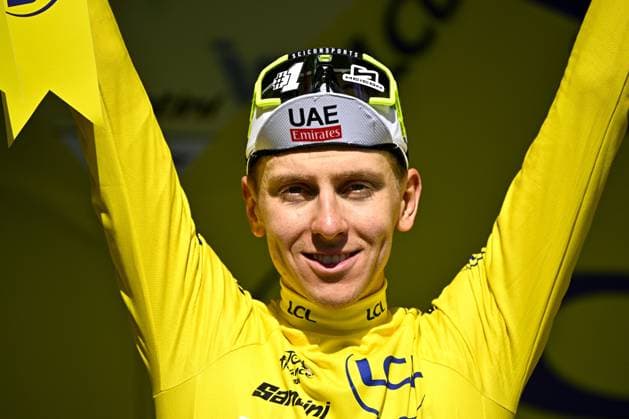 Sport Bilder des Tages Slovenian Tadej Pogacar of UAE Team Emirates celebrates on the podium in the yellow jersey of leader in the overall ranking after stage 12 of the 2024 Tour de France cycling race, from Aurillac to Villeneuve-sur-Lot, France (203,6km) on Thursday 11 July 2024. The 111th edition of the Tour de France starts on Saturday 29 June and will finish in Nice, France on 21 July. JASPERxJACOBS  x96265777x