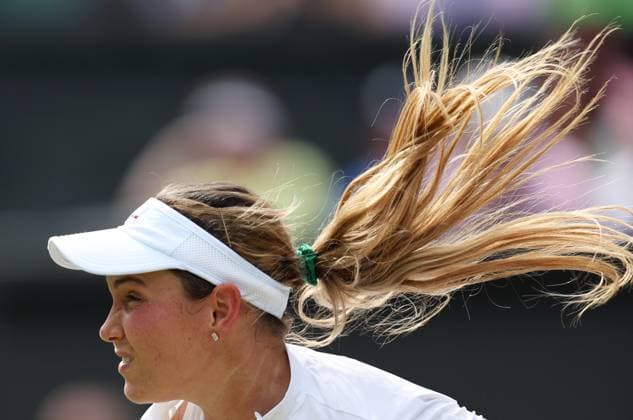 (240712) -- LONDON, July 12, 2024 -- Donna Vekic competes during the women s singles semifinal match between Jasmine Paolini of Italy and Donna Vekic of Croatia at Wimbledon tennis Championship in London, Britain, July 11, 2024. ) (SP)BRITAIN-LONDON-TENNIS-WIMBLEDON-WOMEN S SINGLES-SEMIFINALS LixYing 