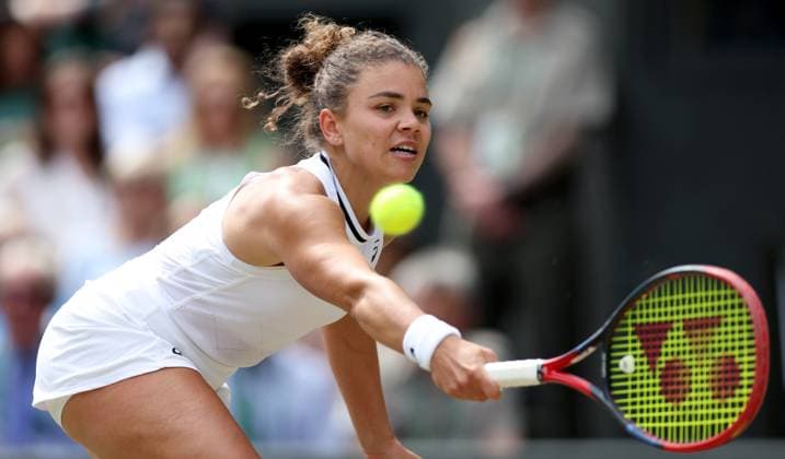 (240712) -- LONDON, July 12, 2024 -- Jasmine Paolini hits a return during the women s singles semifinal match between Jasmine Paolini of Italy and Donna Vekic of Croatia at Wimbledon tennis Championship in London, Britain, July 11, 2024. ) (SP)BRITAIN-LONDON-TENNIS-WIMBLEDON-WOMEN S SINGLES-SEMIFINALS LixYing 