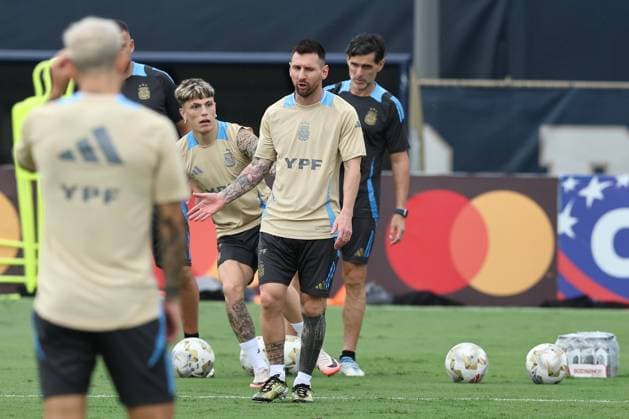 Argentina™s forwards Lionel Messi C and Alejandro Garcnacho take part in a training session ahead the match against Colombia for the Copa America USA 2024 final match, at Florida International University FIU , Miami, on July 11 2024 MIAMI UNITED STATES Copyright: xALEJANDROxPAGNIx
