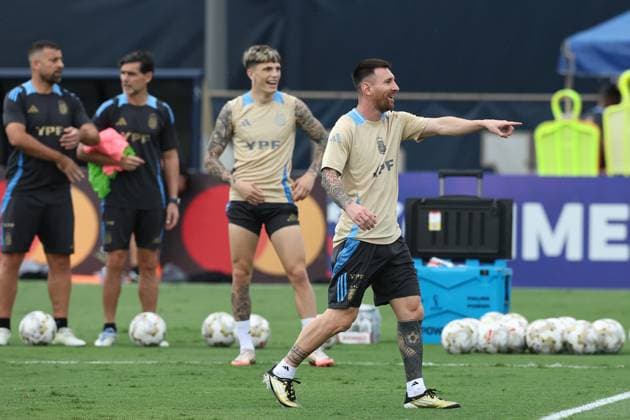 Argentina™s forwards Lionel Messi front and Alejandro Garcnacho take part in a training session ahead the match against Colombia for the Copa America USA 2024 final match, at Florida International University FIU , Miami, on July 11 2024 MIAMI UNITED STATES Copyright: xALEJANDROxPAGNIx