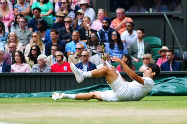 Carlos Alcaraz falls during his semi final match Wimbledon Tennis Championships, Day 12, The All England Lawn Tennis and Croquet Club, London, UK - 12 Jul 2024  Copyright: xJavierxGarcia Shutterstockx 14581882cw