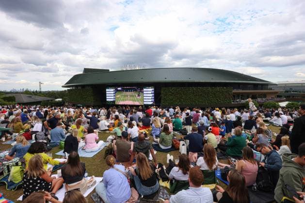 12th July 2024; All England Lawn Tennis and Croquet Club, London, England; Wimbledon Tennis Tournament, Day 12; Hundreds of spectators sitting on Murray Mound watching on Court One big screen the Gentlemen& x2019;s Singles Semi Finals between Lorenzo Musetti (ITA) vs Novak Djokovic (SRB)  ActionPlus12667155 JohnxPatrickxFletcher