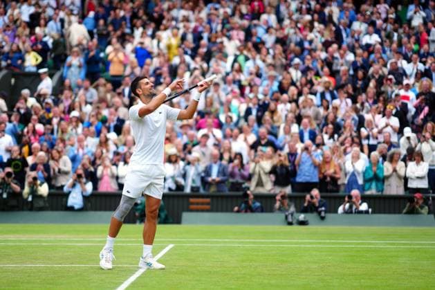 Novak Djokovic celebrates by playing the violin after winning his semi final match Wimbledon Tennis Championships, Day 12, The All England Lawn Tennis and Croquet Club, London, UK - 12 Jul 2024  Copyright: xJavierxGarcia Shutterstockx 14581882io
