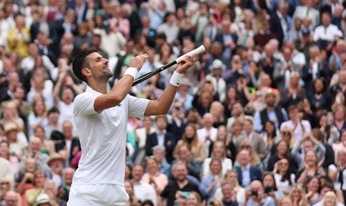 Novak Djokovic is victorious in his Men s Semi-Final match against Lorenzo Musetti at the 2024 Wimbledon Championships in London on Friday, July 12, 2024.  LON2024071274 HUGOxPHILPOTT
