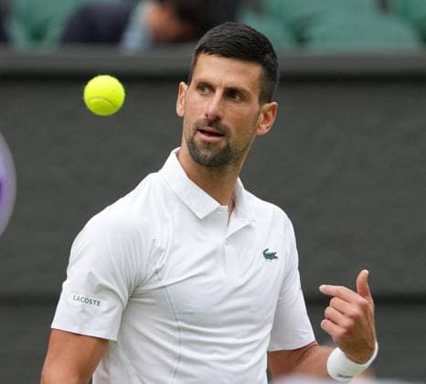 Lawn Tennis - 2024 Wimbledon Championship Mens Singles Semi Final - Novak Djokovic (SRB) v Lorenzo Musetti (ITA) All England Lawn Tennis & Croquet Club - Friday 12h July 2024 Novak Djokovic plays with the crowd 