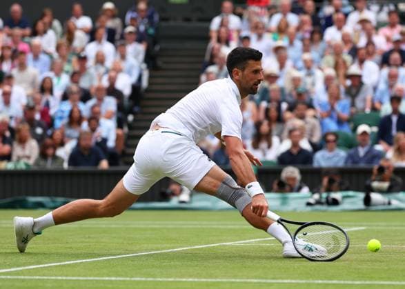12th July 2024; All England Lawn Tennis and Croquet Club, London, England; Wimbledon Tennis Tournament, Day 12; Novak Djokovic (SRB) comes to the net against Lorenzo Musetti (ITA), Gentlemens Singles Semi Finals  ActionPlus12667229 JohnxPatrickxFletcher