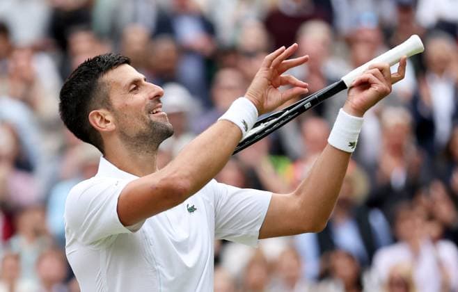 (240713) -- LONDON, July 13, 2024 -- Novak Djokovic celebrates after the men s singles simifinal match between Novak Djokovic of Serbia and Lorenzo Musetti of Italy at Wimbledon tennis Championship in London, Britain, on July 12, 2024. ) (SP)BRITAIN-LONDON-TENNIS-WIMBLEDON-MEN S SINGLES-SEMIFINALS LixYing 
