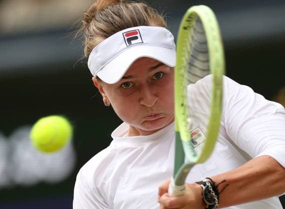 (240713) -- LONDON, July 13, 2024 -- Barbora Krejcikova hits a return during the women s singles final between Barbora Krejcikova of Czech Republic and Jasmine Paolini of Italy at Wimbledon tennis Championship in London, Britain, July 13, 2024. ) (SP)BRITAIN-LONDON-TENNIS-WIMBLEDON--WOMEN S SINGLES-FINAL LixYing 