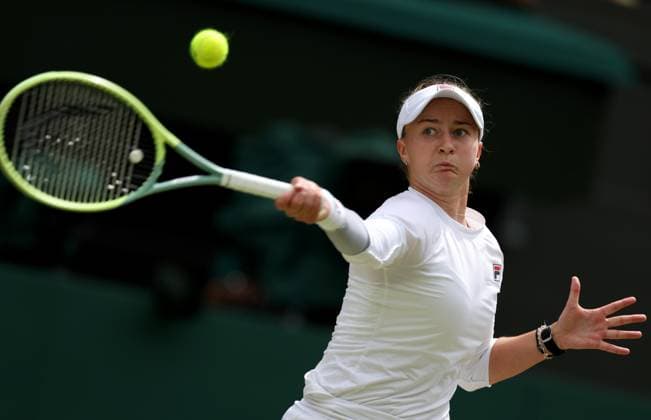 (240713) -- LONDON, July 13, 2024 -- Barbora Krejcikova hits a return during the women s singles final between Barbora Krejcikova of Czech Republic and Jasmine Paolini of Italy at Wimbledon tennis Championship in London, Britain, July 13, 2024. ) (SP)BRITAIN-LONDON-TENNIS-WIMBLEDON--WOMEN S SINGLES-FINAL LixYing 