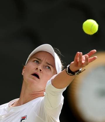 (240713) -- LONDON, July 13, 2024 -- Barbora Krejcikova serves during the women s singles final between Barbora Krejcikova of Czech Republic and Jasmine Paolini of Italy at Wimbledon tennis Championship in London, Britain, July 13, 2024. ) (SP)BRITAIN-LONDON-TENNIS-WIMBLEDON--WOMEN S SINGLES-FINAL LixYing 