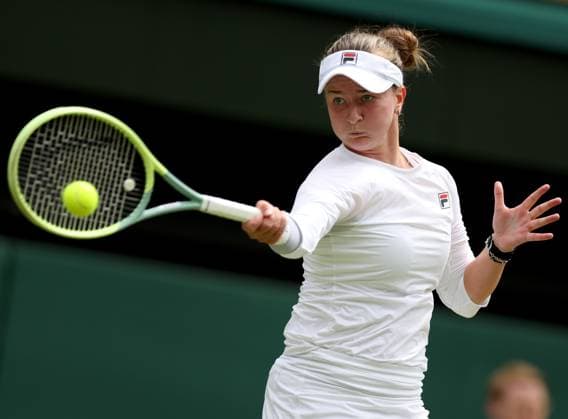 (240713) -- LONDON, July 13, 2024 -- Barbora Krejcikova hits a return during the women s singles final between Barbora Krejcikova of Czech Republic and Jasmine Paolini of Italy at Wimbledon tennis Championship in London, Britain, July 13, 2024. ) (SP)BRITAIN-LONDON-TENNIS-WIMBLEDON--WOMEN S SINGLES-FINAL LixYing 