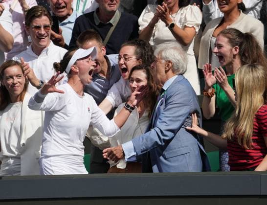 Lawn Tennis - 2024 Wimbledon Championship Ladies Singles Final - Barbora Krejcikova (CZE) v Jasmine Paolini (ITA) All England Lawn Tennis & Croquet Club - Saturday 13th July 2024 Barbora Krejcikova (CZE) jumps into the players box to greet Family and coaches after the match 
