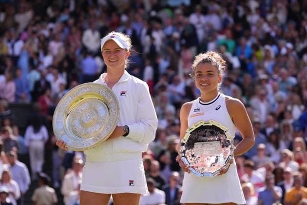 LONDON, ENGLAND - JULY 13: Barbora Krejcikova of Czechia poses with the Ladies Singles Trophy alongside Jasmine Paolini of Italy with her Ladies Singles Runner-Up Trophy following the Ladies Singles Final match during day thirteen of The Championships Wimbledon 2024 at All England Lawn Tennis and Croquet Club on July 13, 2024 in London, England  Copyright: xHiroshixSatox