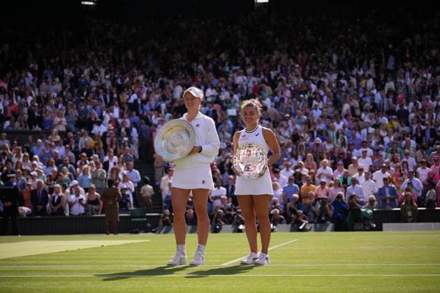 LONDON, ENGLAND - JULY 13: Barbora Krejcikova of Czechia poses with the Ladies Singles Trophy alongside Jasmine Paolini of Italy with her Ladies Singles Runner-Up Trophy following the Ladies Singles Final match during day thirteen of The Championships Wimbledon 2024 at All England Lawn Tennis and Croquet Club on July 13, 2024 in London, England  Copyright: xHiroshixSatox