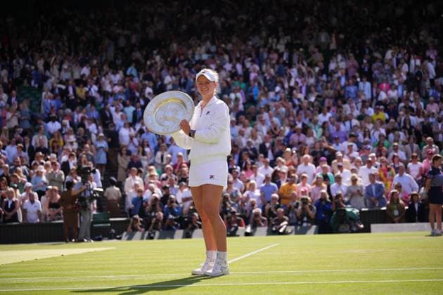 LONDON, ENGLAND - JULY 13: Barbora Krejcikova of Czechia celebrates with the Ladies Singles Trophy following victory against Jasmine Paolini of Italy in the Ladies Singles Final match during day thirteen of The Championships Wimbledon 2024 at All England Lawn Tennis and Croquet Club on July 13, 2024 in London, England.  Copyright: xHiroshixSatox
