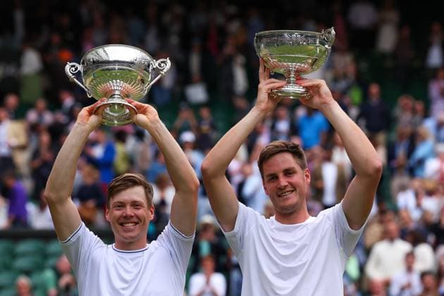 13th July 2024; All England Lawn Tennis and Croquet Club, London, England; Wimbledon Tennis Tournament, Day 13; Harri Heliovaara (FIN) and Henry Patten (GBR) both lift their Gentlemen& x2019;s Doubles Trophy after defeating Max Purcell (AUS) and Jordan Thompson (AUS)  ActionPlus12667615 JohnxPatrickxFletcher