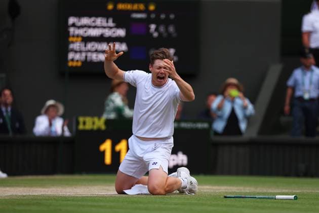 13th July 2024; All England Lawn Tennis and Croquet Club, London, England; Wimbledon Tennis Tournament, Day 13; Harri Heliovaara (FIN) celebrate with Henry Patten (GBR) after defeating Max Purcell (AUS) and Jordan Thompson (AUS) in the Gentlemen& x2019;s Doubles Finals  ActionPlus12667625 JohnxPatrickxFletcher