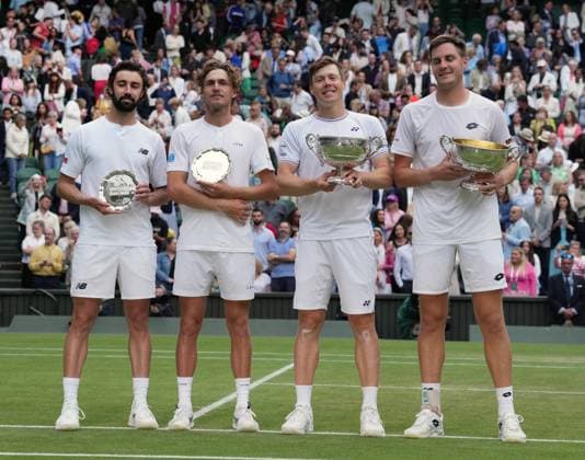 Lawn Tennis - 2024 Wimbledon Championship Mens Doubles Final - Max Purcell and Jordan Thompson (AUS) v Harri Heliovaara (FIN) and Henry Patten (GBR) All England Lawn Tennis & Croquet Club - Saturday 13th July 2024 Winners, Harri Heliovaara (FIN) and Henry Patten (GBR) (Right) and Max Purcell and Jordan Thompson (left) 