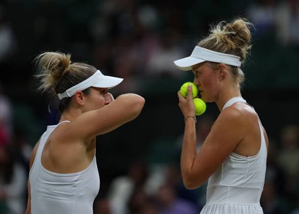 13th July 2024; All England Lawn Tennis and Croquet Club, London, England; Wimbledon Tennis Tournament, Day 13; Erin Routliffe (NZL) talks tactics with doubles partner Gabriela Dabrowski (CAN) versus Katerina Siniakova (CZE) and Taylor Townsend (USA), Ladies Doubles Finals  ActionPlus12667698 JohnxPatrickxFletcher