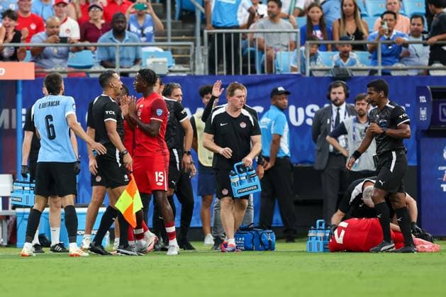 July 13, 2024, Charlotte, North Carolina, U.S: Canada defender MOISE BOMBITO (15) challenges the line official during the first half of the CONMEBOL Copa America match between Uruguay and Canada at Bank of America Stadium in Charlotte, NC on July 13, 2024. Charlotte U.S - ZUMAk149 20240713_zsp_k149_038 Copyright: xCoryxKnowltonx