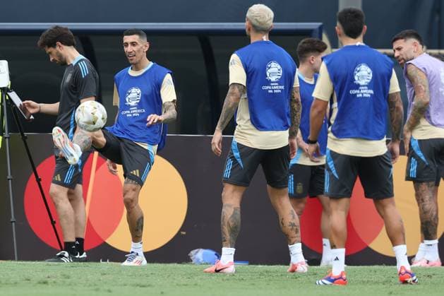 Argentina s forward Angel Di Maria L takes part in a training session ahead the match against Colombia for the Copa America USA 2024 final match, at Florida International University FIU , Miami, on July 13, 2024 MIAMI UNITED STATES Copyright: xALEJANDROxPAGNIx