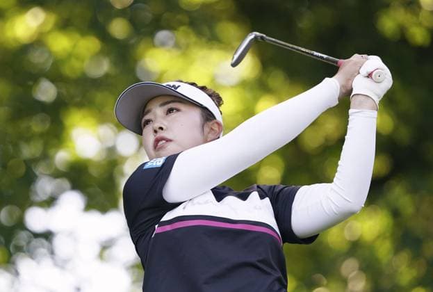 Golf: Evian Championship Miyu Yamashita of Japan hits off the second tee during the final round of the Evian championship golf tournament at Evian Resort Golf Club in Evian-les-Bains, France, on July 14, 2024.  A14AA0003133833P