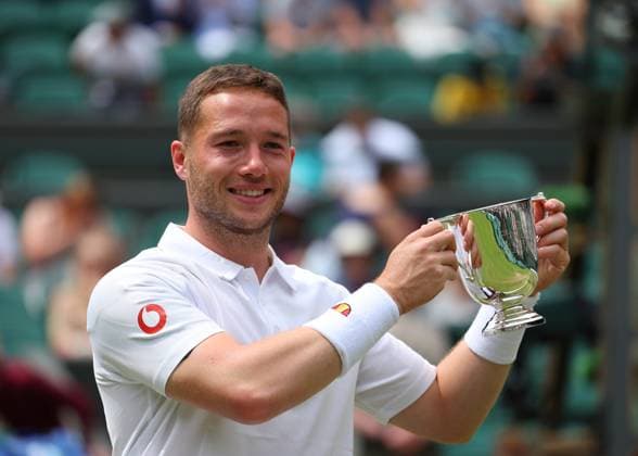 14th July 2024; All England Lawn Tennis and Croquet Club, London, England; Wimbledon Tennis Tournament, Day 14; Alfie Hewett (GBR) lifts the Gentlemen Wheelchair Singles trophy after defeating Martin De La Puente (ESP) in straight sets  ActionPlus12667779 JohnxPatrickxFletcher