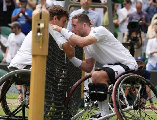 Lawn Tennis - 2024 Wimbledon Championship Mens Wheelchair Singles Final Alfie Hewitt (GBR) v Martin De la Puente (ESP) All England Lawn Tennis & Croquet Club - Sunday 14th July 2024 Alfie Hewitt (GBR) consoles Martin De la Puente at the net after the match 