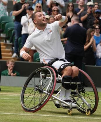 Lawn Tennis - 2024 Wimbledon Championship Mens Wheelchair Singles Final Alfie Hewitt (GBR) v Martin De la Puente (ESP) All England Lawn Tennis & Croquet Club - Sunday 14th July 2024 Alfie Hewitt (GBR) celebrates winning match point 
