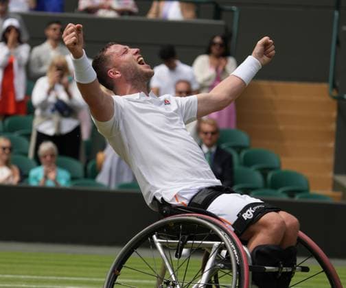 Lawn Tennis - 2024 Wimbledon Championship Mens Wheelchair Singles Final Alfie Hewitt (GBR) v Martin De la Puente (ESP) All England Lawn Tennis & Croquet Club - Sunday 14th July 2024 Alfie Hewitt (GBR) celebrates winning match point 